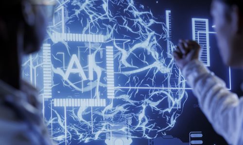 Computer scientists brainstorm ways to use AI cognitive computing to extract usable information from complex data. Data center employees implement artificial intelligence to process massive datasets